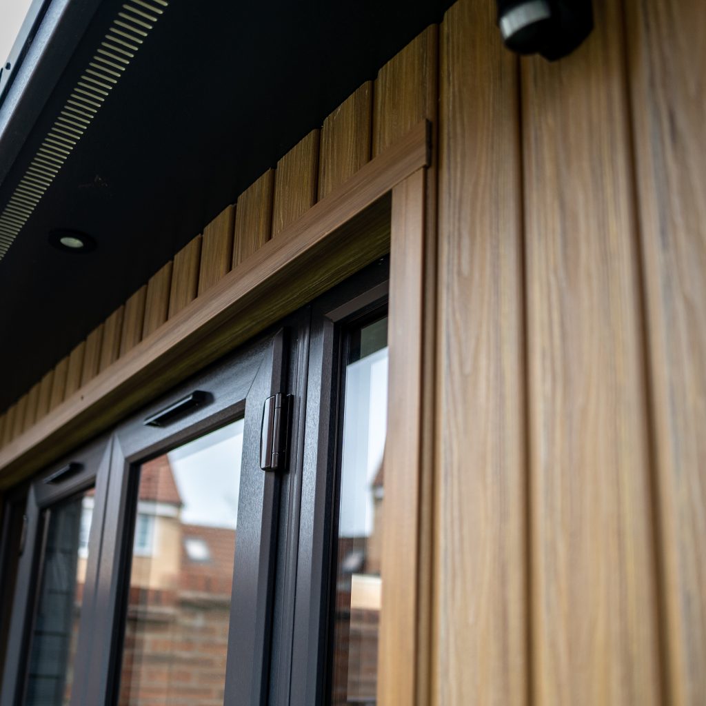 Close up of our cedar cladding and anthracite doors.